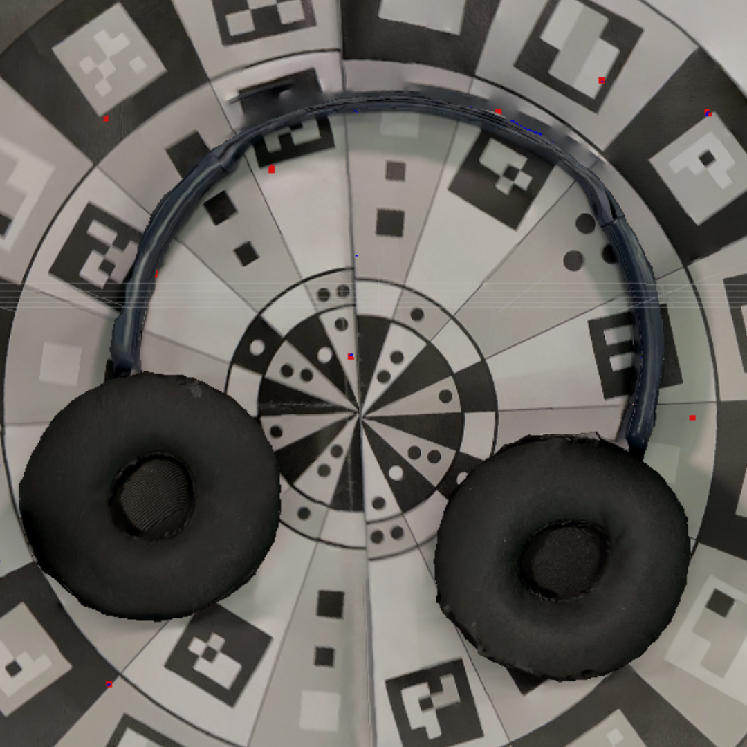 Even when I rescanned my headphones with the iPad, the top was scanned much more accurately, but it still couldn't capture the connecting part between the two sides and left holes.